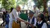 21. Ms. Vicki Randall shakes the hand of a member of the Phil. Retirees Association 2.jpg