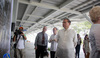 3. Cong. Bataoil reads the history of the Puerto Princesa Airport, on the photowalls.jpg