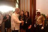 031. Arrival of the GOH, Secretary of National Defense, Hon. Delfin Lorenzana, welcomed by PLTFMs. Debbie Tan and Ms. Jenny Gapuz.jpg